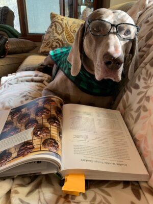 Hank deciding what to bake for dessert